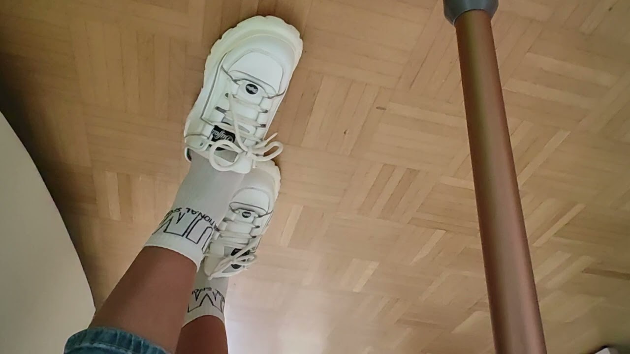 Pantyhose Girl in white Buffalo Clogs to puma socks