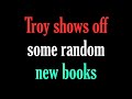 Troy shows off some random new books