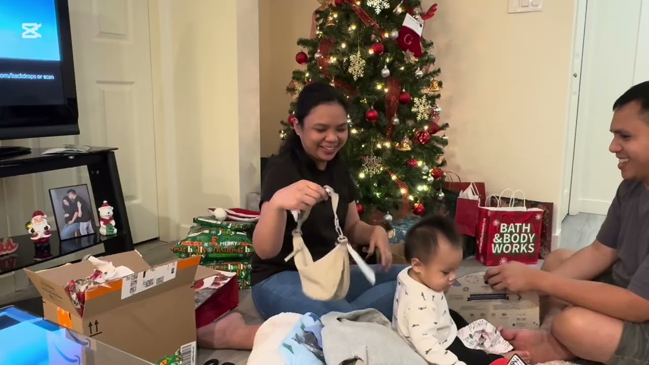 Unwrapping our Christmas gifts as a family here in Canada 🇨🇦🎁 