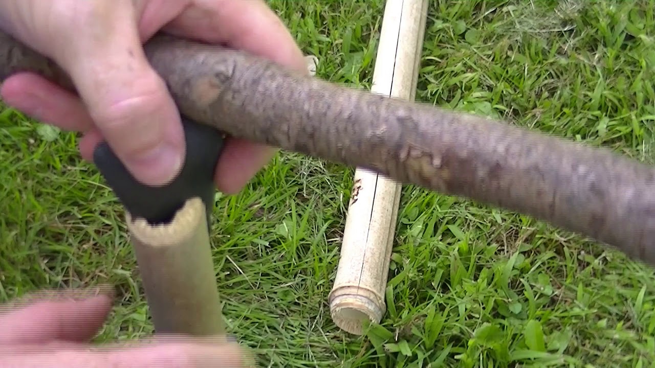 Bamboo firesaw kit with stone tools