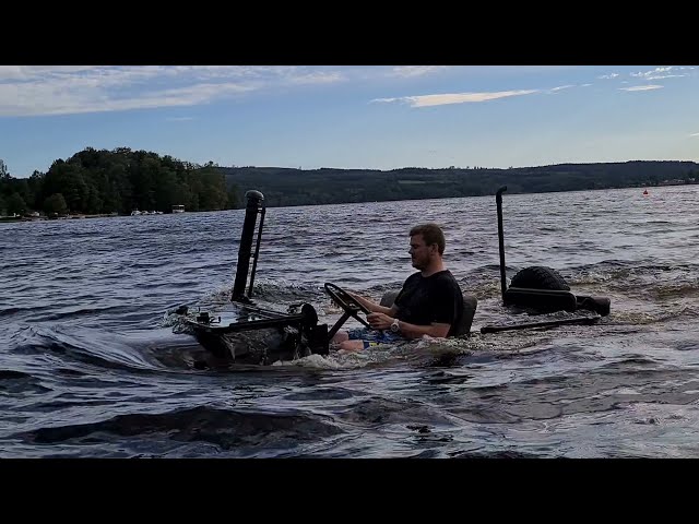 Emil driving his m38a1 jeep in water with fording kit