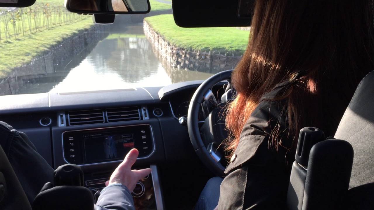 Abbie fording in a new Range Rover at Easton Castle - YouTube