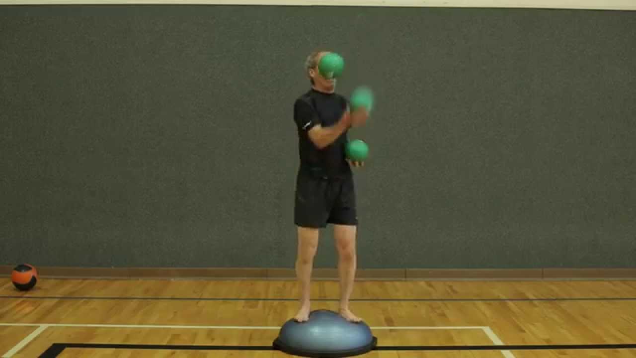 Juggling sixpound medicine balls while standing on a BOSU YouTube