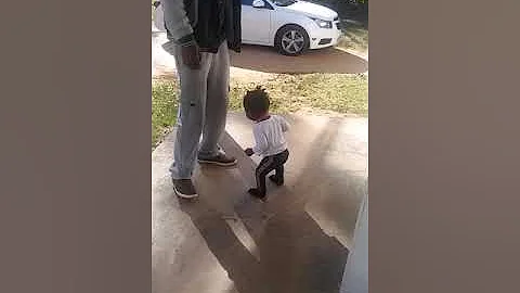 Baby girl learning to walk