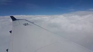 Pilatus PC-12 flying above the clouds