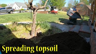 Finishing The Downspouts And Spreading Topsoil