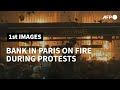 Bank on fire in Paris during protest over new security law | AFP