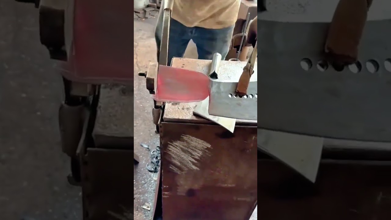 Skilled Blacksmith Forging a Glowing Red Blade with Care and Precision