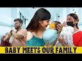 Family meets baby for the first time 