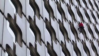 'I couldn't shake off fear of rain' - 53yo 'Spiderman' scales Paris skyscraper w/o safety harness