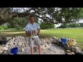 ￼Abo spalling large coral with hammerstone