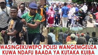 KIBAKA ANUSURIKA KUWAWA NA WANANCHI BAADA YA KUIBA POCHI AOKOLEWA NA POLISI.