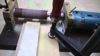 A simple jig for easy making transition from peghead to fingerboard on Strat-type guitars.