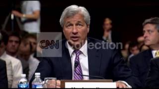FILE:JPMORGAN'S CEO BONUS,SALARY SLASHED BY 53%
