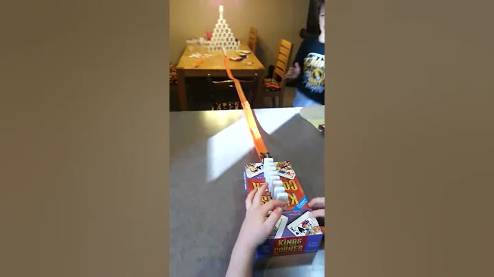 Dominoes versus pyramid of cups
