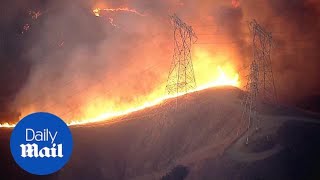 California fires: Aerial footage shows massive Silverado Fire burning in CA hills