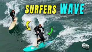 Three Surfers Collide While Riding Same Wave