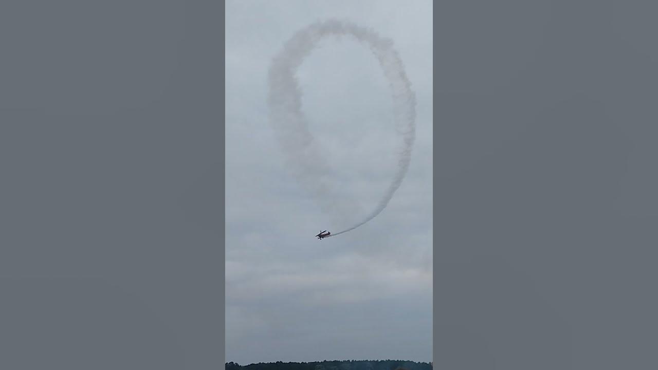 plane flipping upside down with guy standing on top (watch til the end