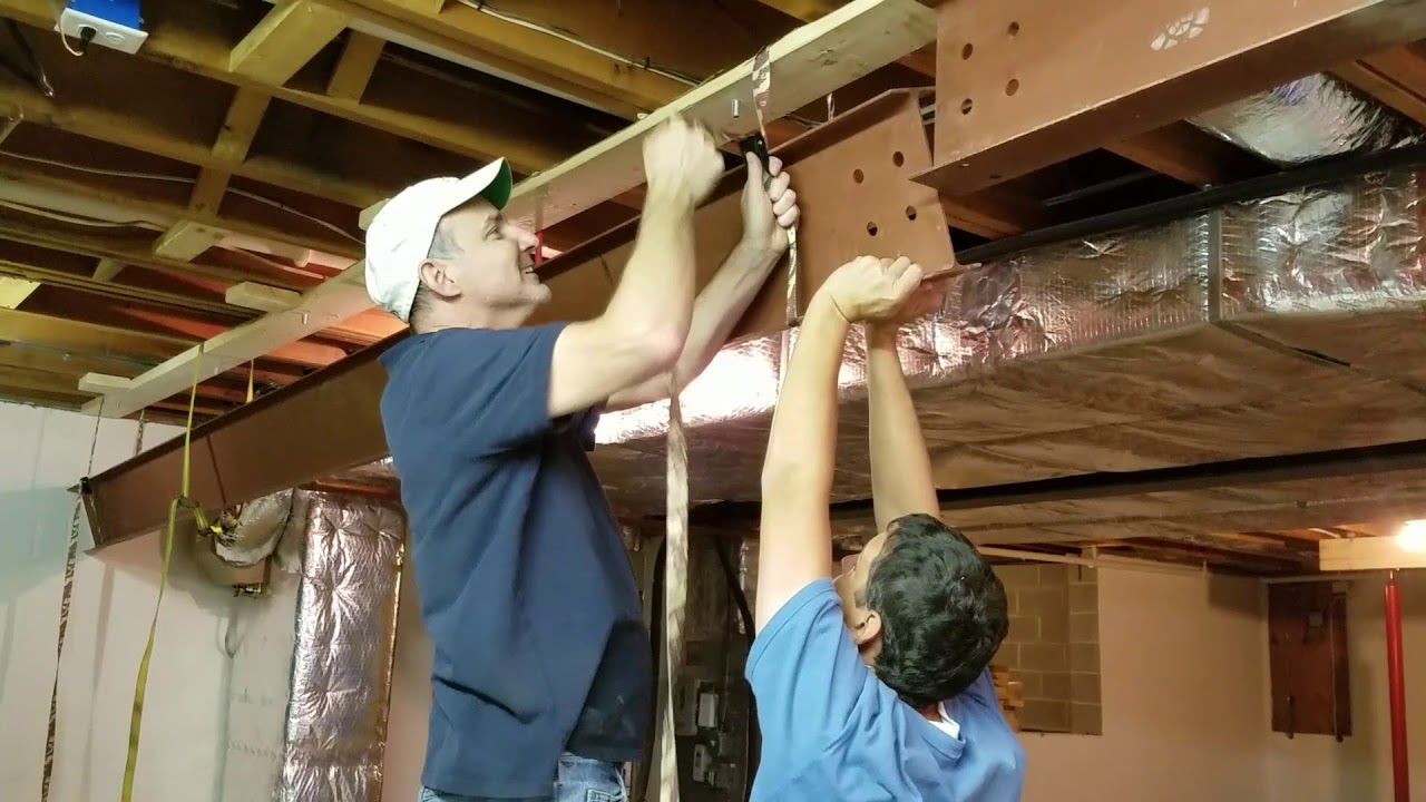 How to Raise Steel Beam in Existing Home - YouTube