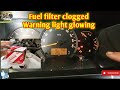 Fuel filter clogged warning light glowing (need to replace fuel filter)