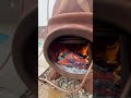 Wood burning DIY pool heater on Havasu rainy day