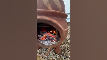 Wood burning DIY pool heater on Havasu rainy day