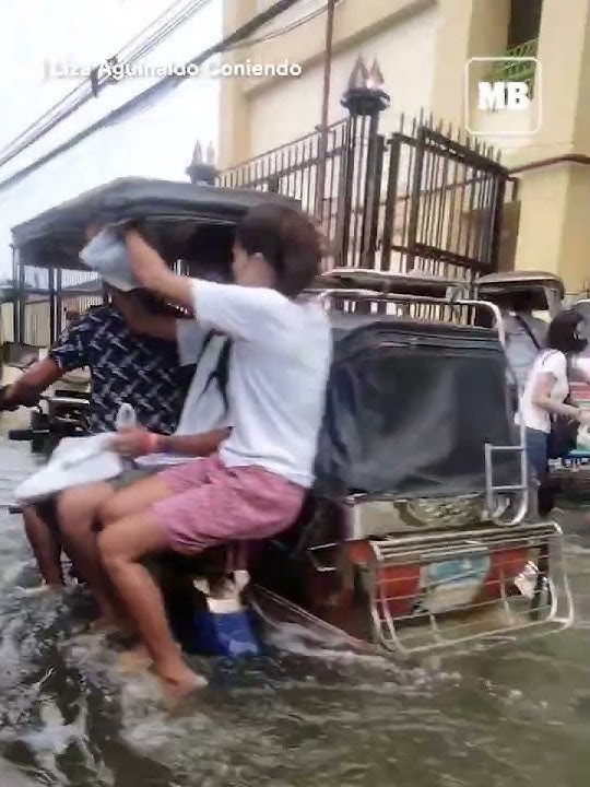 Students in Hagonoy, Bulacan braved the flood during the first day of classes