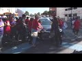 Man drives through protesters blocking road in Southern California