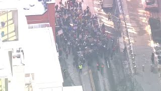 Rally for Justice marches across Brooklyn Bridge into Manhattan on MLK Jr. Day