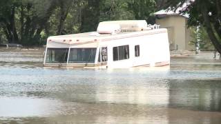 Picking up after Rock Rapids flooding