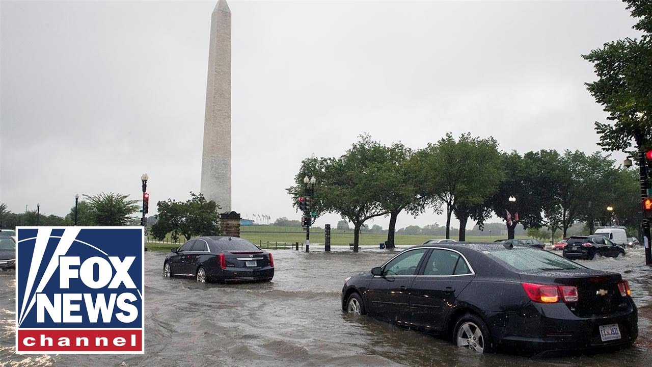 Heavy rains trigger flash flooding in Washington, DC