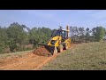 jcb dozing and leveling the soil on a new road || jcb dozing power