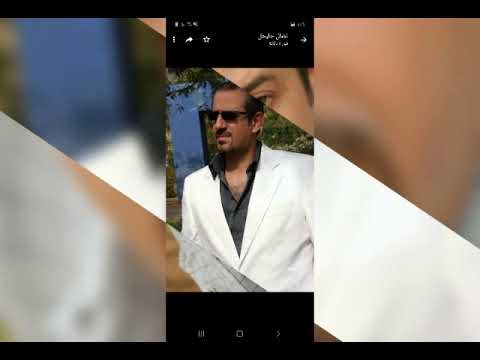 نضال حليحل وانا واقف عالطريق ناطر سيارة تاكسي