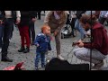 Little Boy Dancing in Brussels with Street Performer