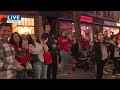 Dr. Corey Pompey directs UW-Madison Marching Band during homecoming parade