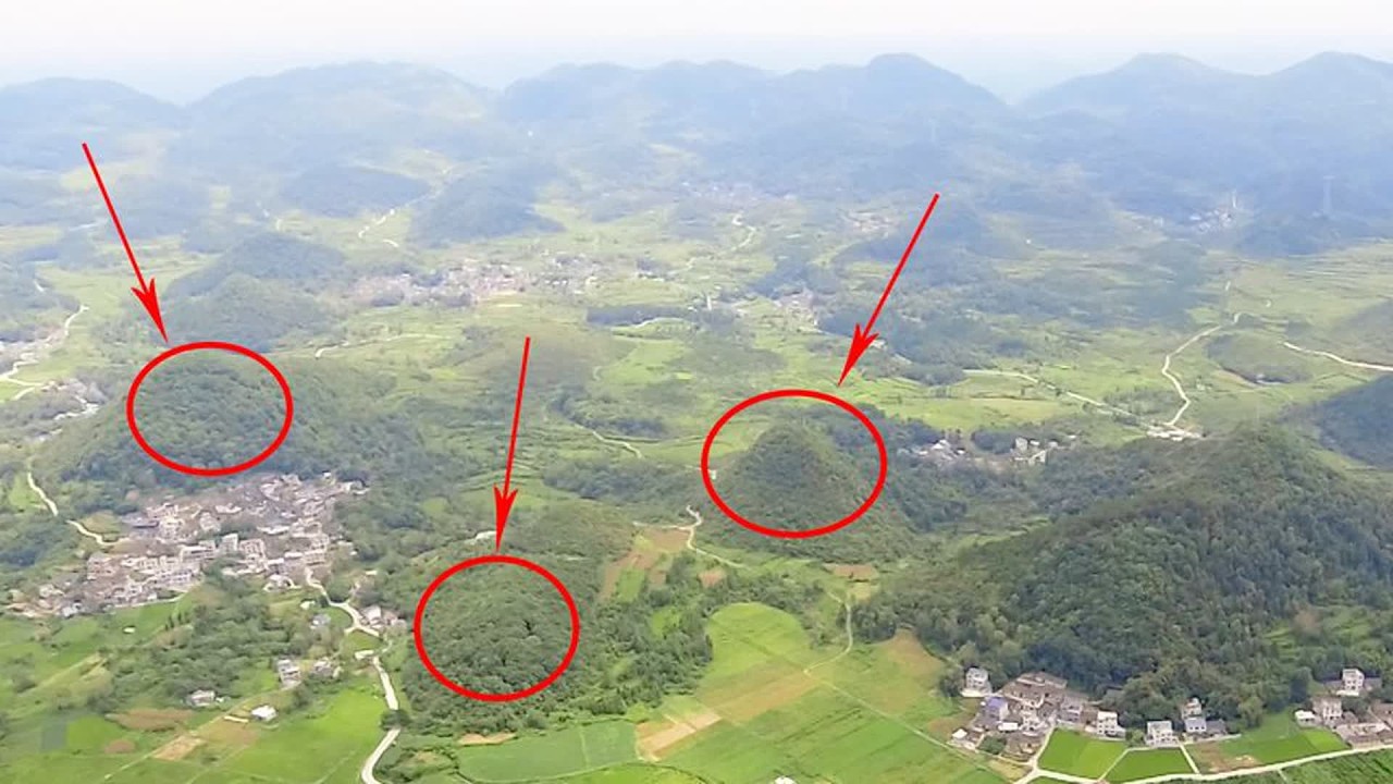 湖南一个小镇的山又圆又尖，据说这里是风水宝地，航拍后果真如此