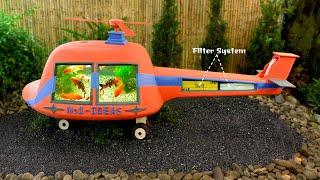 Only with cement and sand, we can make unique aquarium helicopter