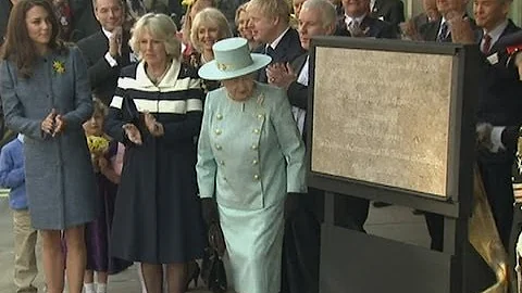 Queen jokes about her hat on visit to Fortnum and ...