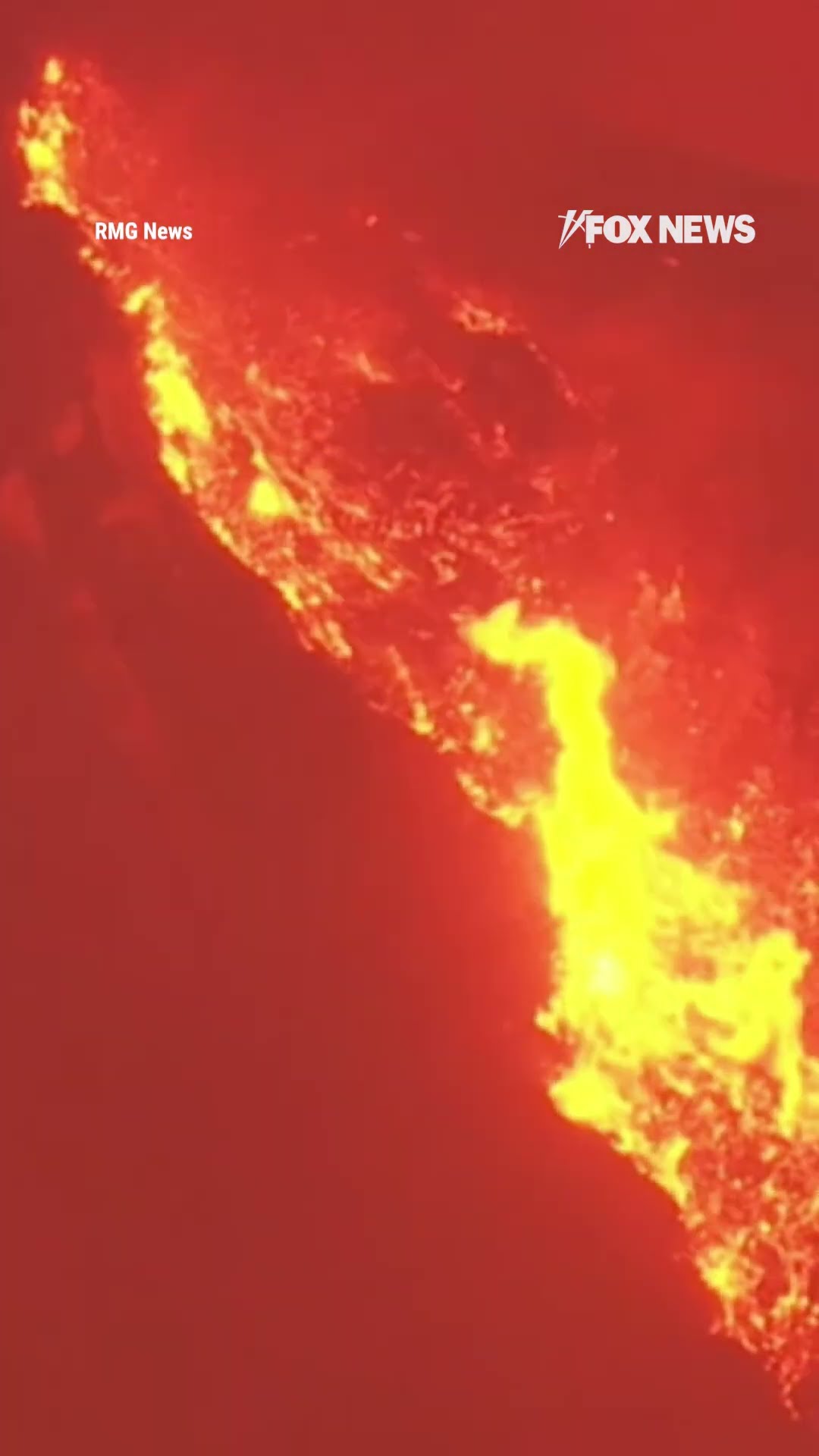 Massive wildfire explodes near college in California as students flee to safety