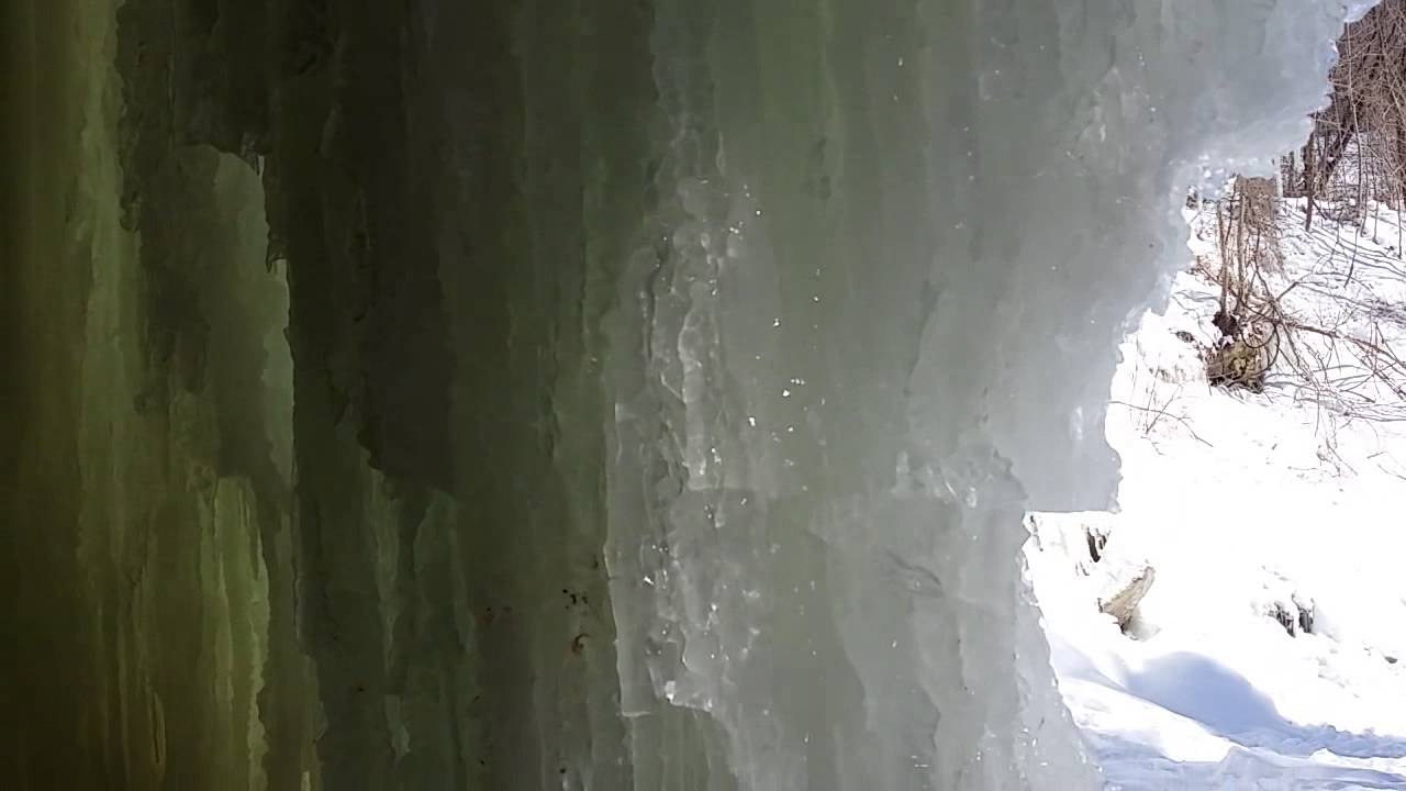 Behind the frozen waterfall - YouTube