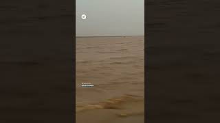 Water and hail cover the desert dunes of Saudi Arabia