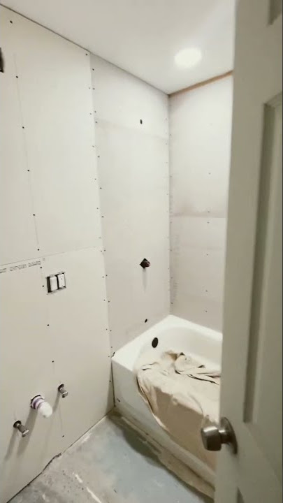 Watch us convert a basement into an apartment 🤯 Bathroom #shorts #remodel #rehab #chicago