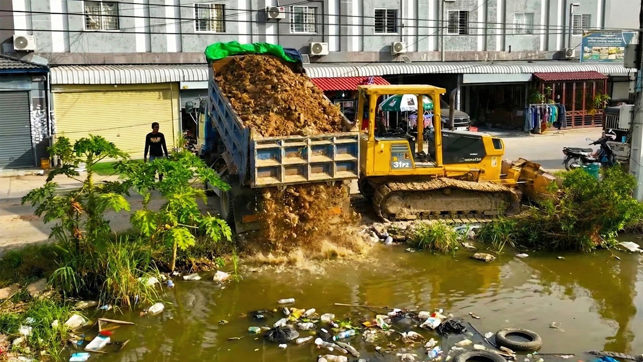 First Start New Project! Landfill on Flooded Area by Skill Dozer D31PX Pushing Stone with 5Ton Truck