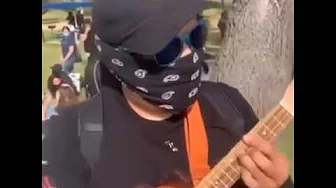 man plays spongebob (Twelfth Street Rag) on ukulele