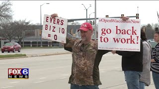 Crowds gather in Brookfield, Burlington to protest ‘Safer at Home’