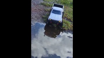 rc crawler wpl c24 in deep water