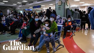 Children's hospital overrun as respiratory sickness takes hold in China