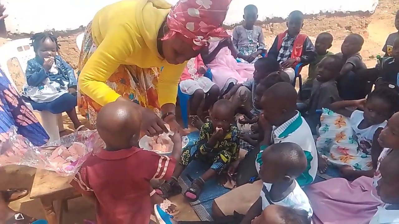 Children's Church celebrating with cutting the cake 