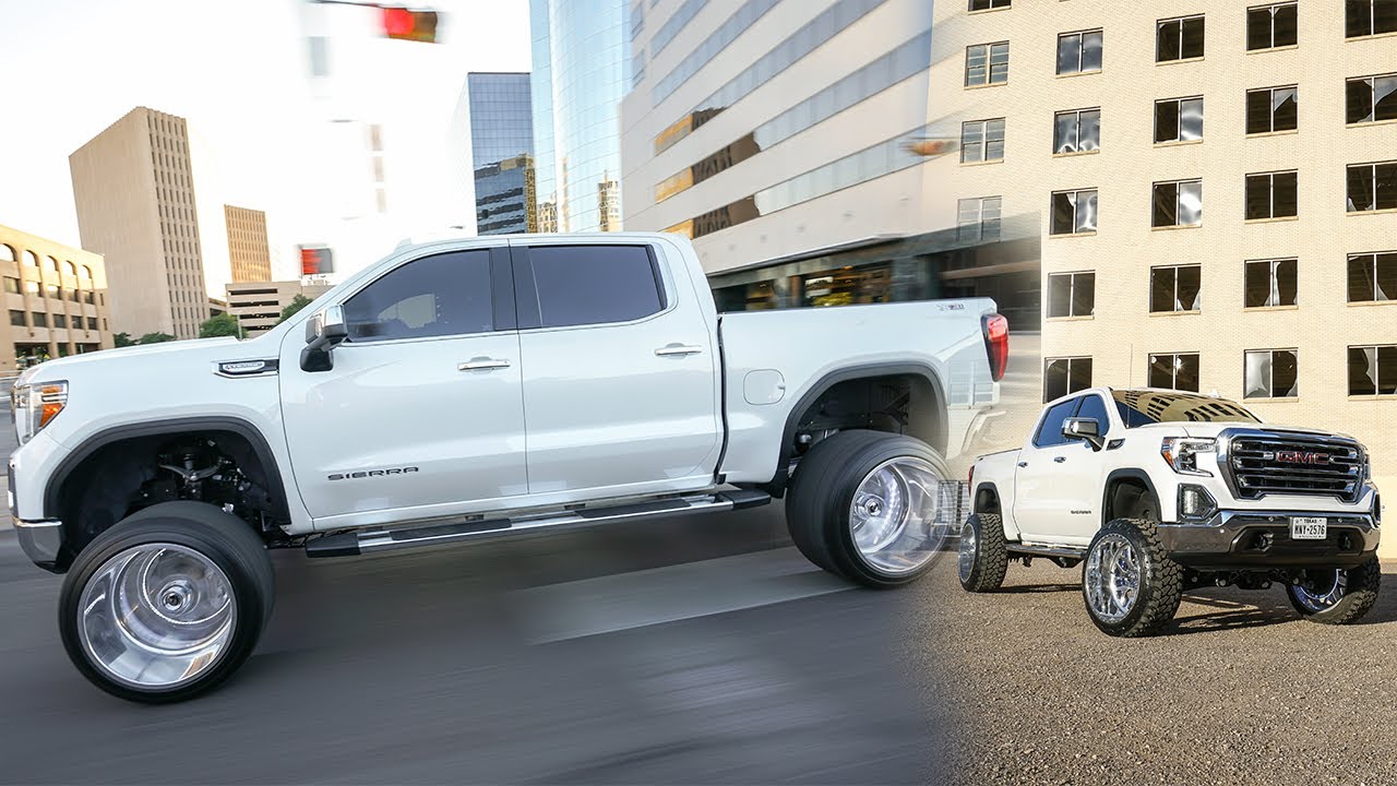 2019 GMC Sierra 1500 lifted on 24x14s with a 7/9 inch lift cruises in