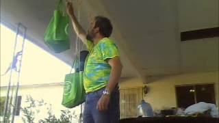ALS Ice Bucket Challenge, Thermite/ Rube Goldberg Style
This is my ALS Ice Bucket Challenge, thanks Ben Thomas. In this setup, some thermite (sparklers) severs one line of two holding the heavy bag on the right. That bag then descends rapidly, and a pulley then upends the Ice Bucket, thereby delivering the requisite quantity of dihydrogen monoxide (in both solid and liquid forms) to my upper torso. Physics Rules! ALS Ice Bucket Challenge, Thermite/ Rube Goldberg Style